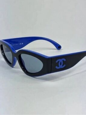Black and White Cat-Eye Sunglasses with Brown Lenses